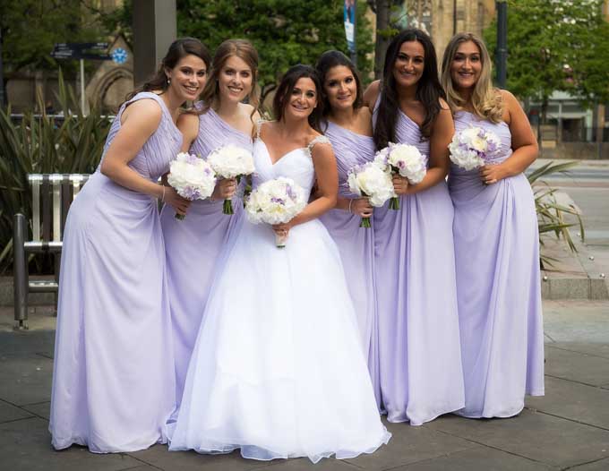Wedding photography - Bride and bridesmaids in City Square, Leeds