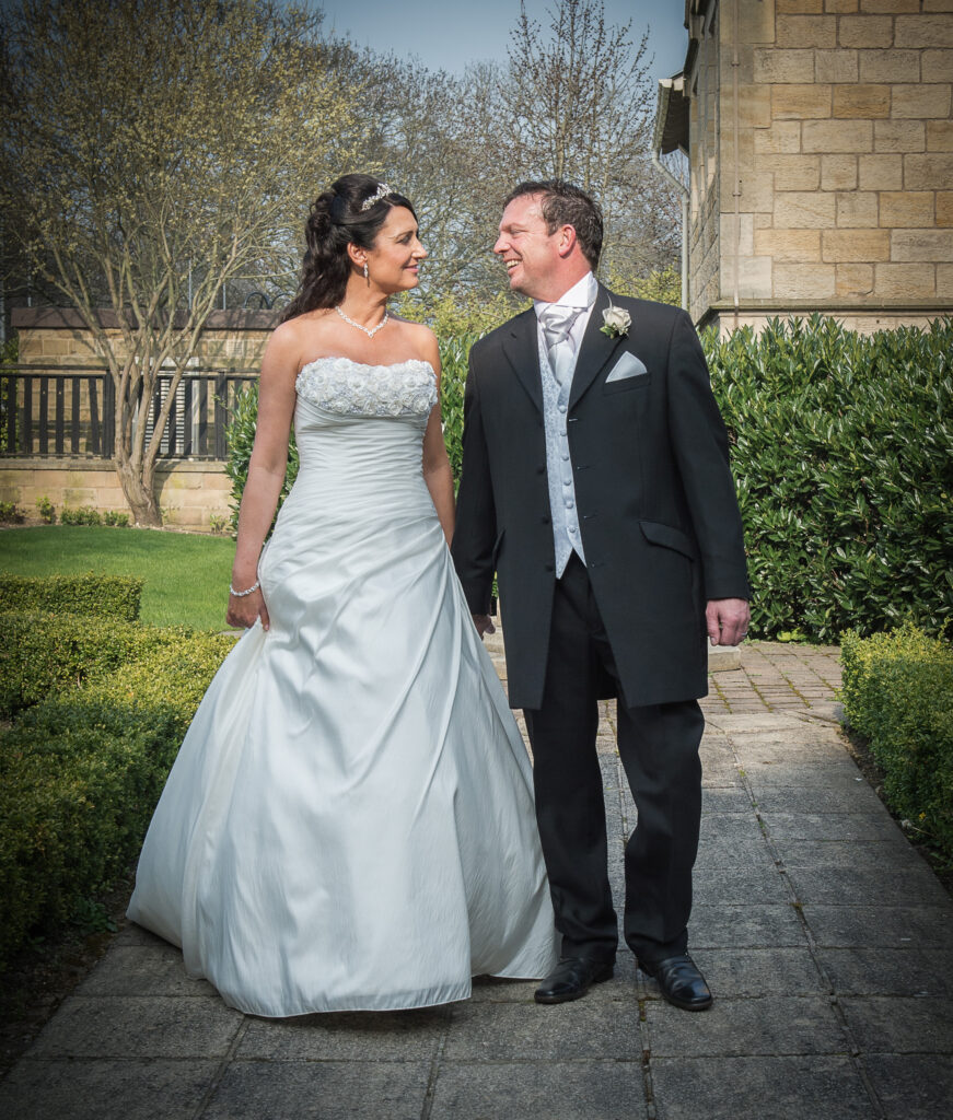 The moment it becomes official. Capturing the quiet focus and emotion during the exchange of vows is what wedding photography is all about.
