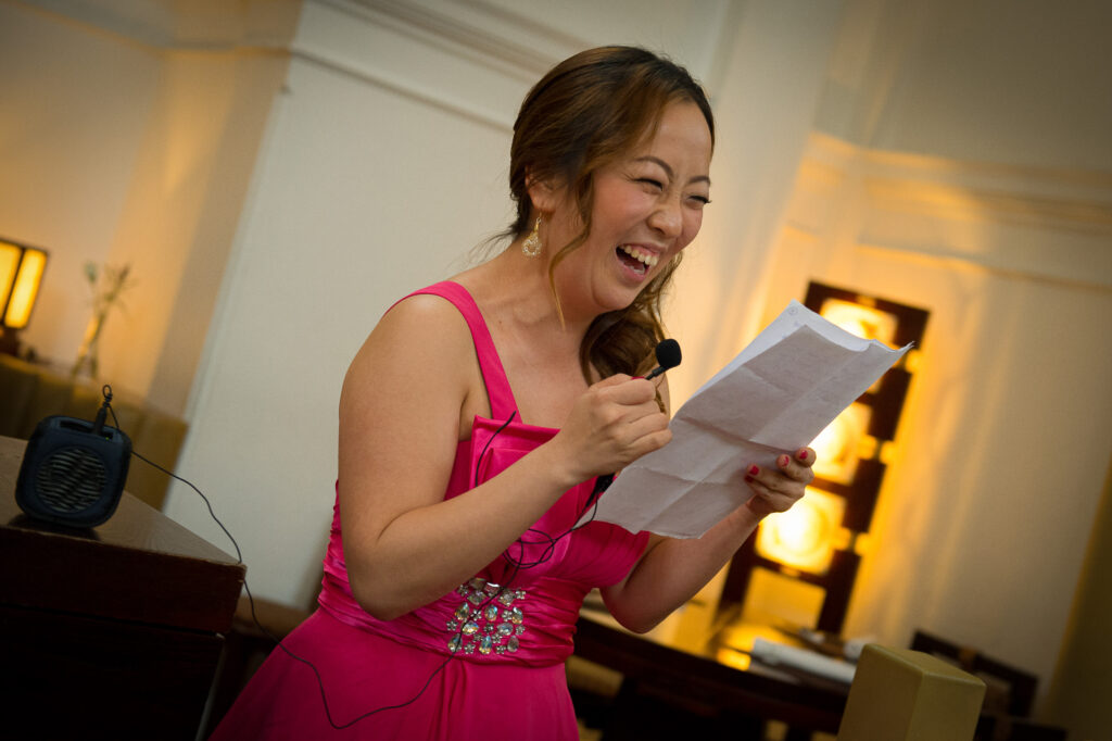 The Weight of Words: A bridesmaid's reaction during the speeches. We document the reactions that form the soul of your family history.