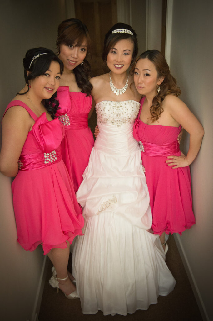 Real Connection: Moving away from stiff lineups. This Harrogate bridal party portrait captures the genuine dynamic of a lifelong friendship.