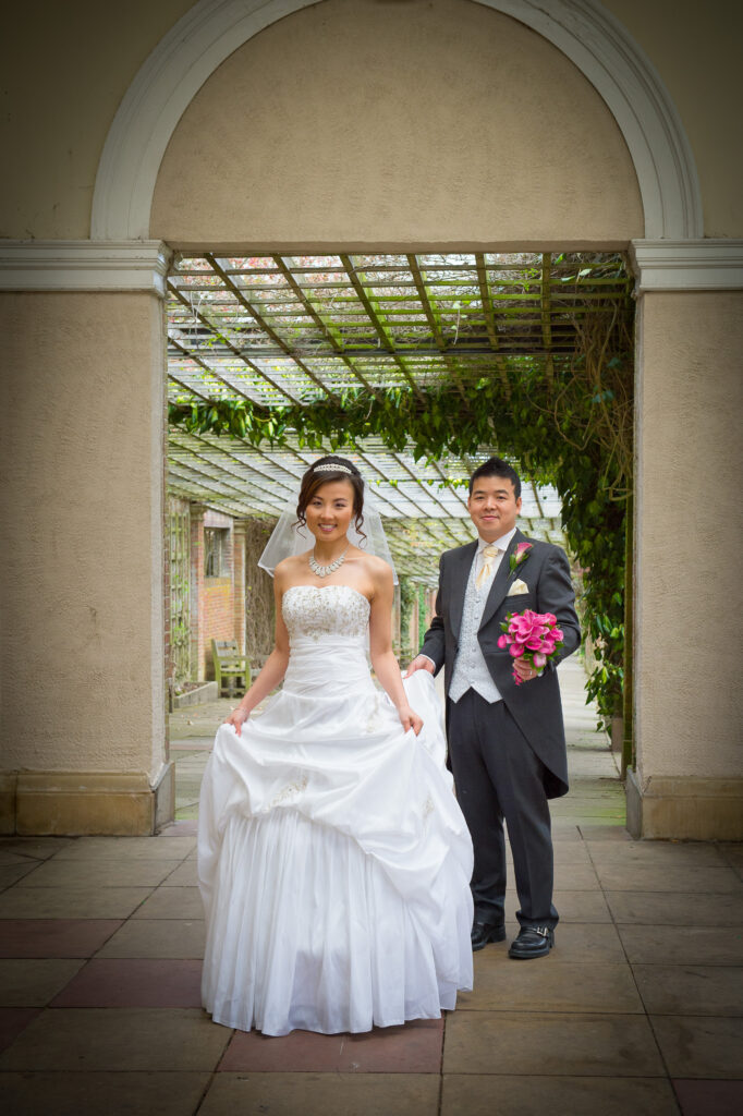Architectural Truth: Utilizing the symmetry of a Harrogate garden venue to create a legacy-grade portrait that transcends temporary trends.