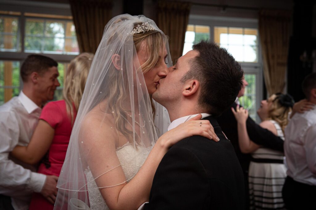 An unwavering promise. A tight, emotionally filled portrait that captures the heart of your first dance. Every kiss, every glance, is our specialty.