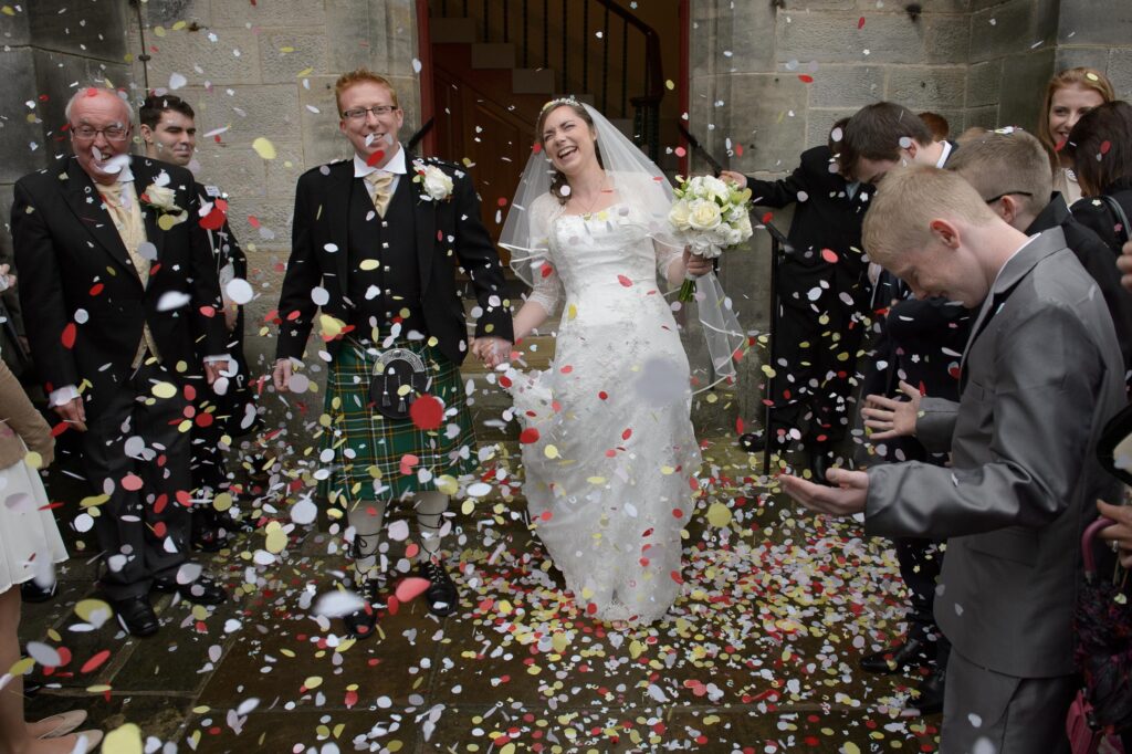 Bride and groom confetti exit at Christ Church Harrogate.